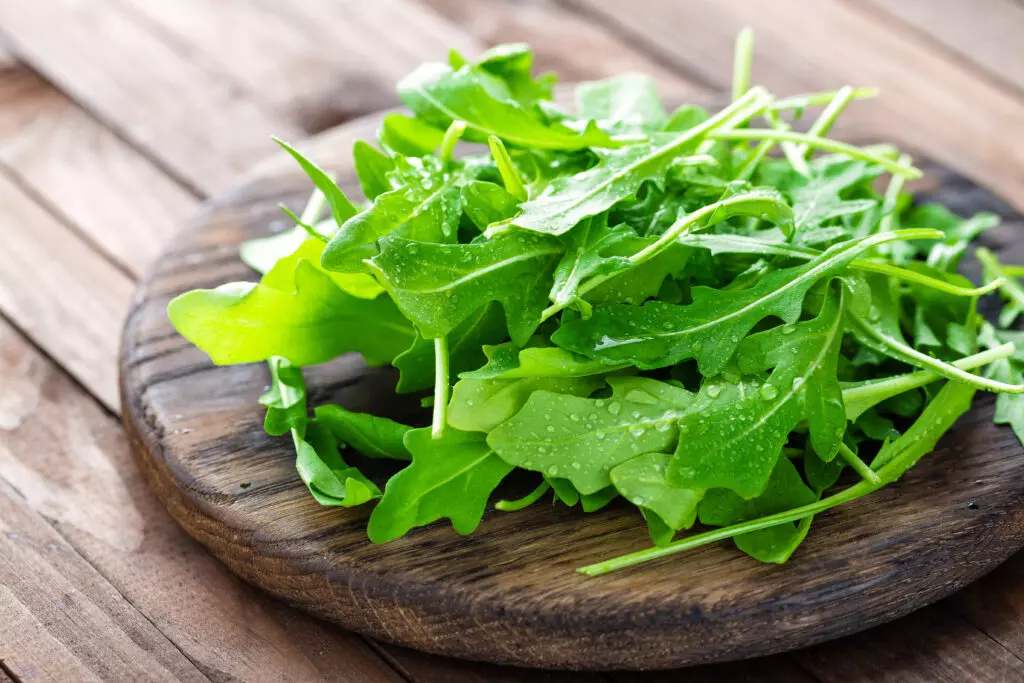 Close up shot of arugula.  Combined with lemon zest and ginger, this is my favorite substitute for lemongrass.