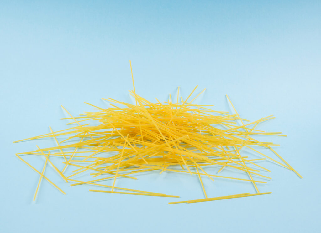 Broken spaghetti noodles.  While unconventional, this is also a great orzo pasta substitute.