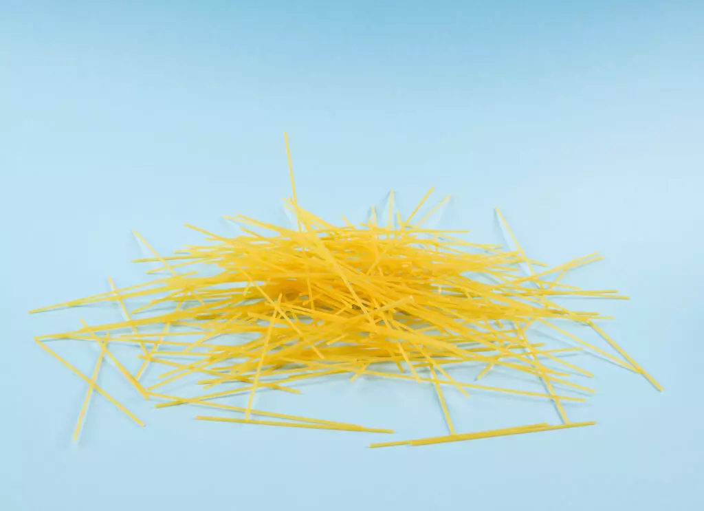 Broken spaghetti noodles.  While unconventional, this is also a great orzo pasta substitute.