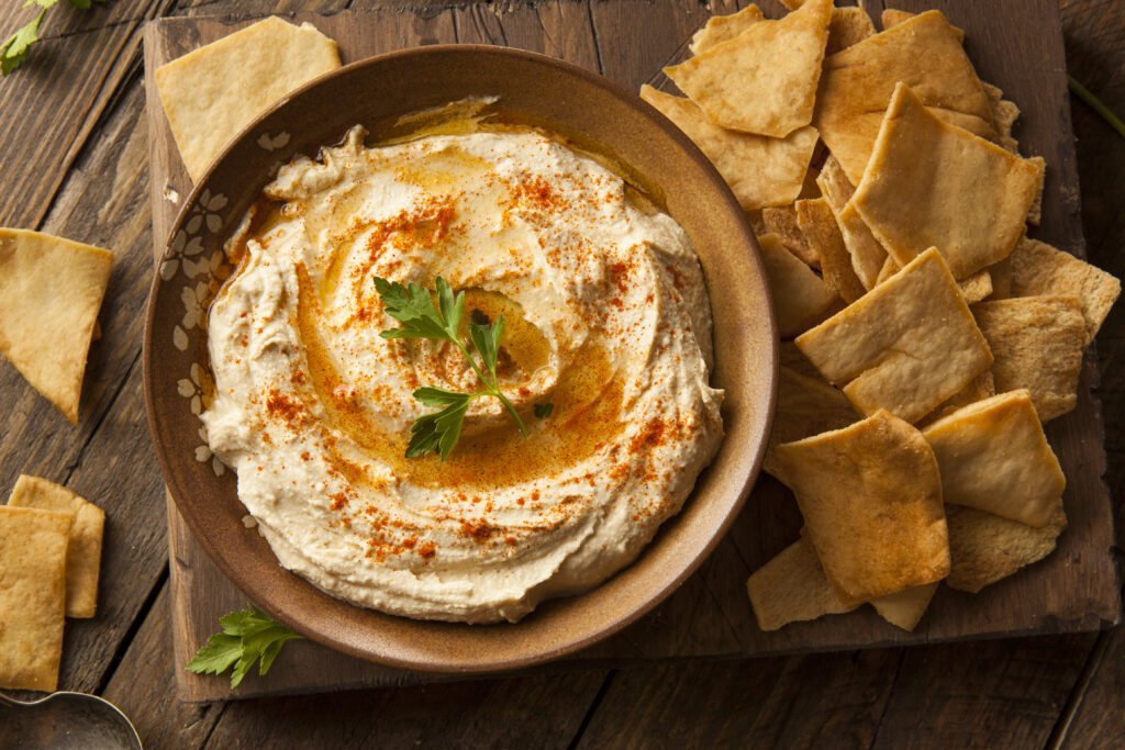Hummus with herbs and falafal chips