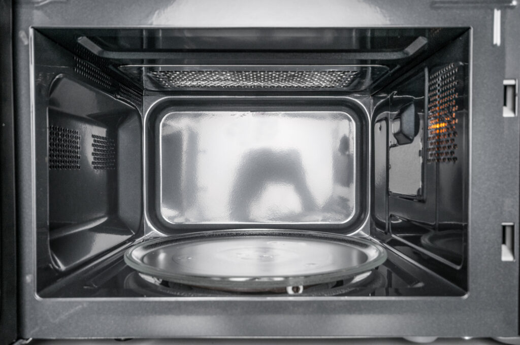 Inside of a microwave.  You can also use the microwave to soften avocados.
