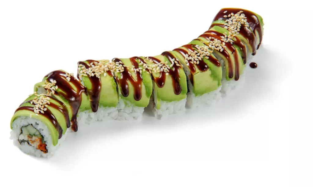 Dragon rolls topped with unagi (eel) sauce and sesame seeds