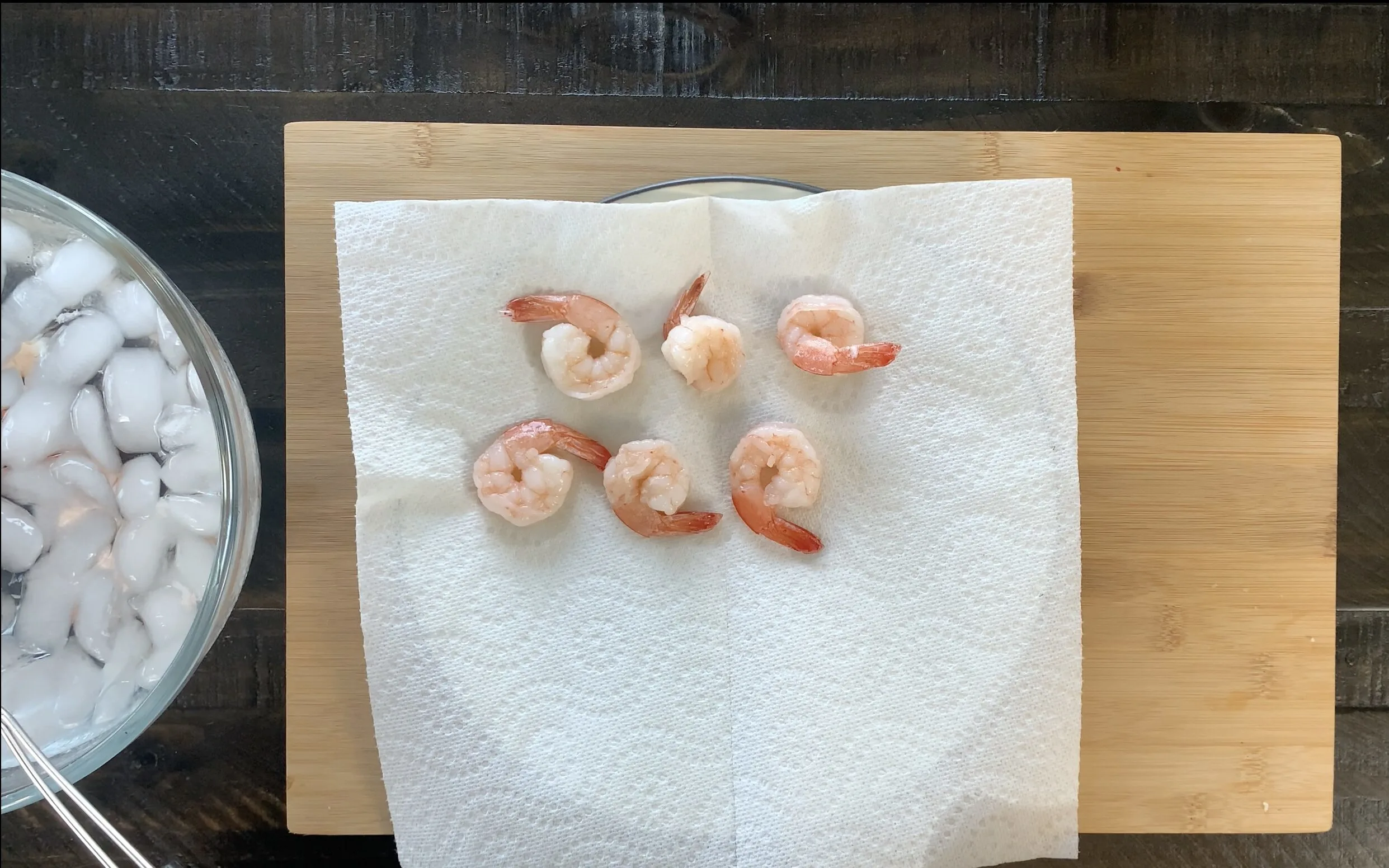 Removing shrimp from ice water