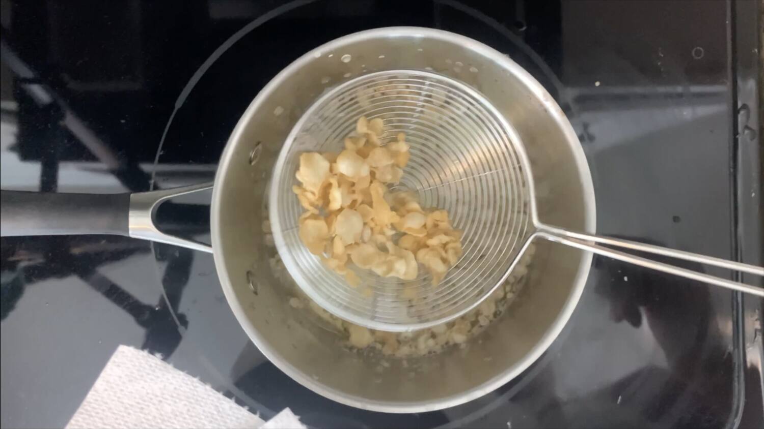 Remove batter from oil