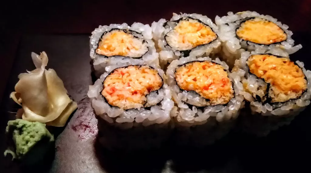 Close up of spicy crab rolls with wasabi and ginger