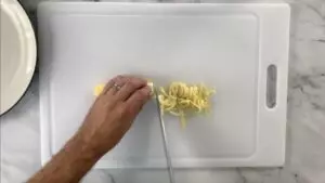 Cut egg into strips