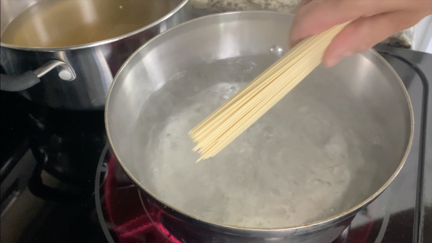 Add ramen noodles to pot of boiling water.