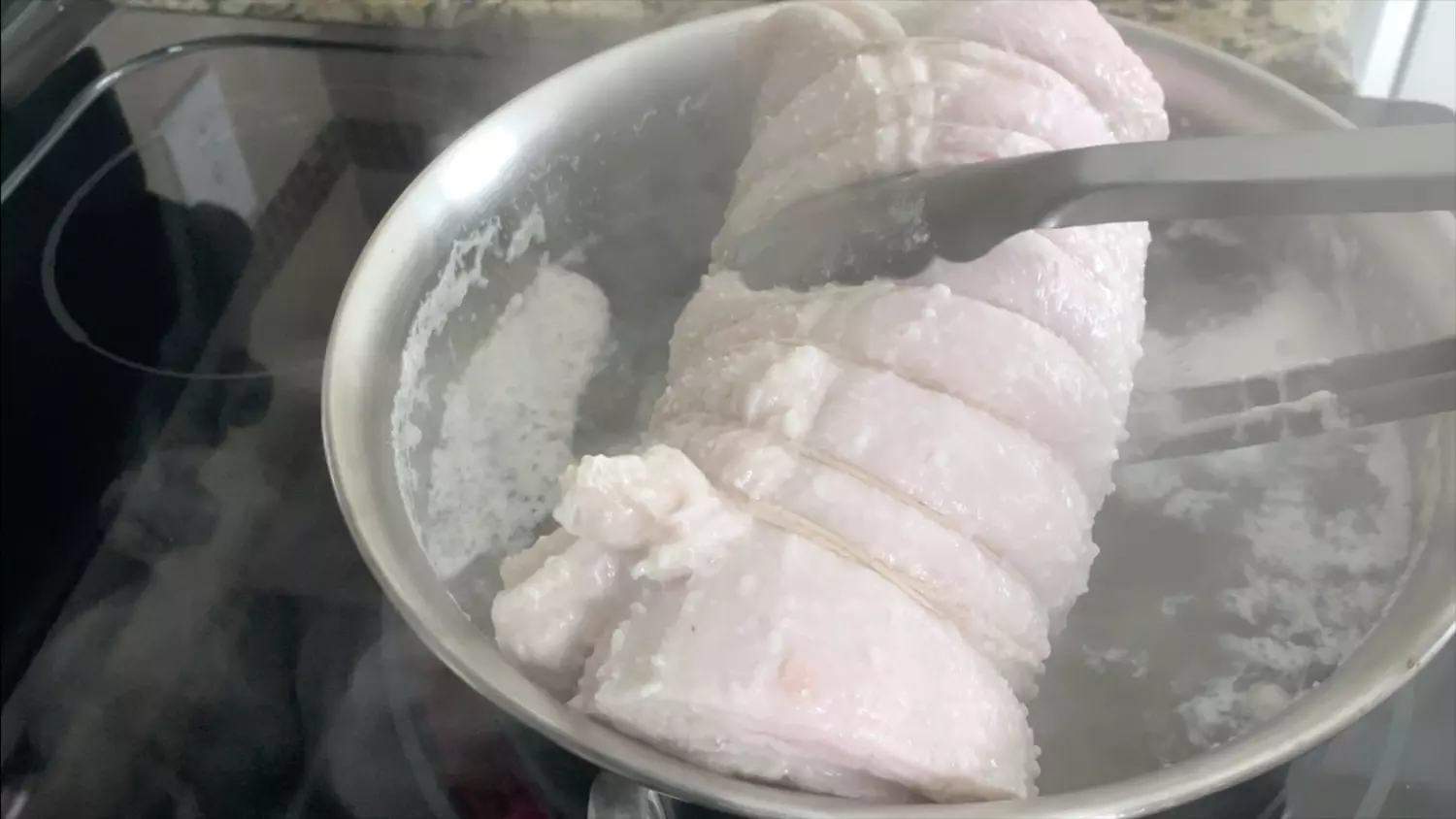After the water comes to a boil, remove pork belly from boiling water to remove impurities.