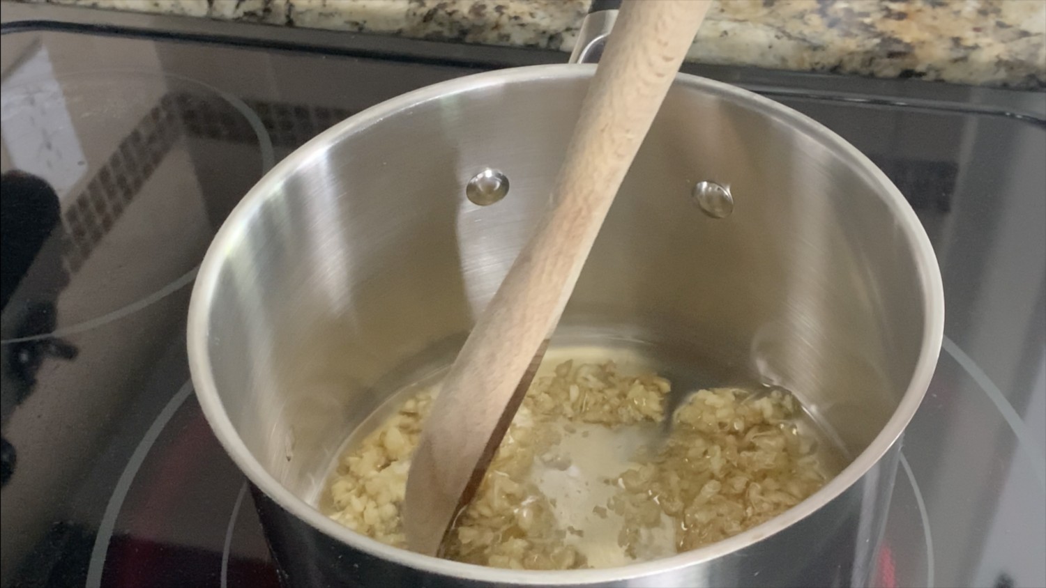 Cook garlic and ginger into oils for shoyu ramen