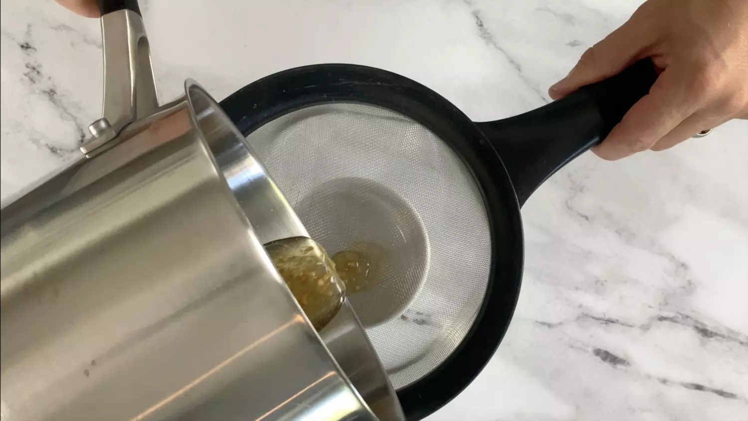 Strain aromatic oils into a small bowl