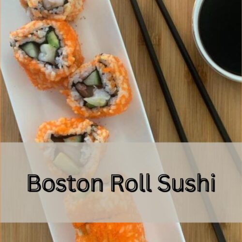 Boston roll sushi arranged on a white plate on a bamboo cutting board. Presented with black chopsticks and a ramekin of soy sauce.