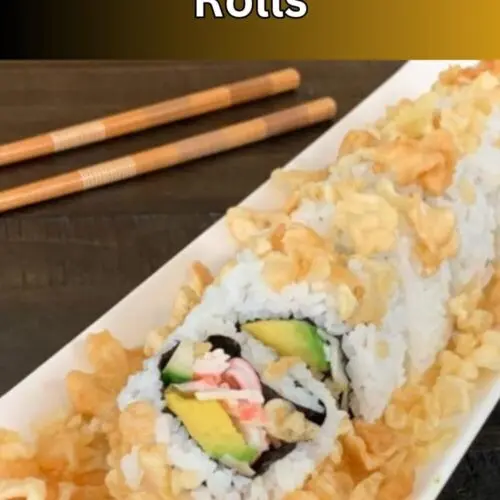 Crunchy California rolls on a white plate with chopsticks in the background.