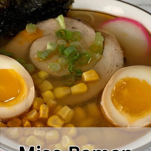 Miso ramen in a Japanese bowl with chashu pork, nori, ramen egg, corn, and kamaboko