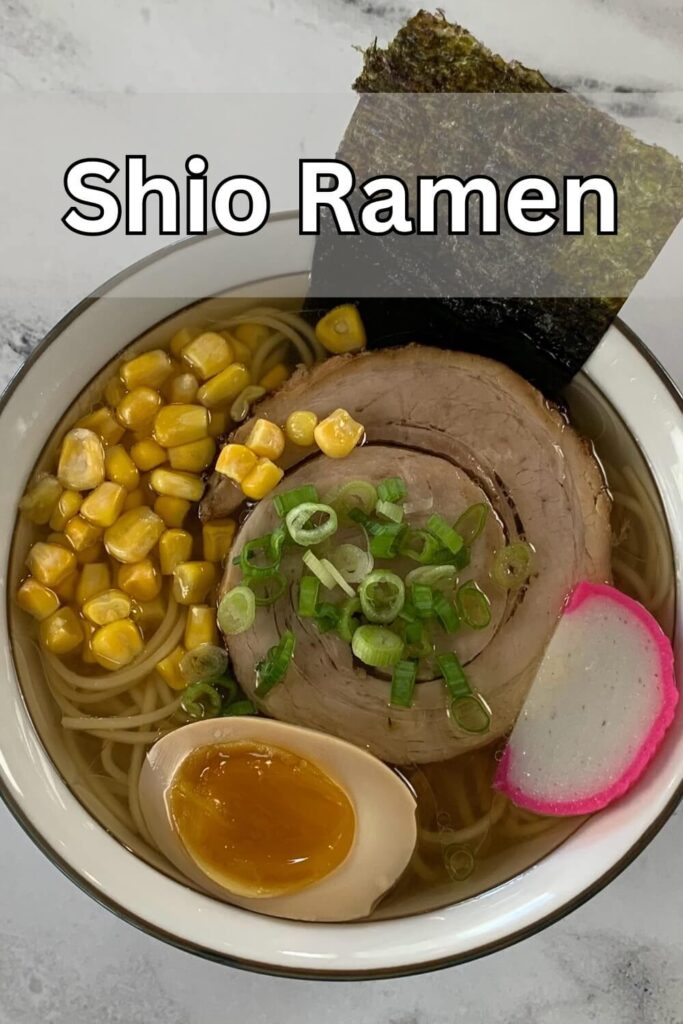 Shio Ramen in a bowl with a white marble background.