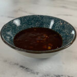 Katsu sauce in a blue Japanese ramekin square photo for recipe.