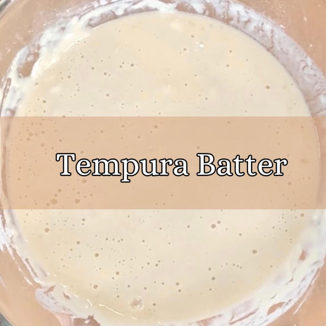 Tempura batter in a mixing bowl square thumbnail photo.