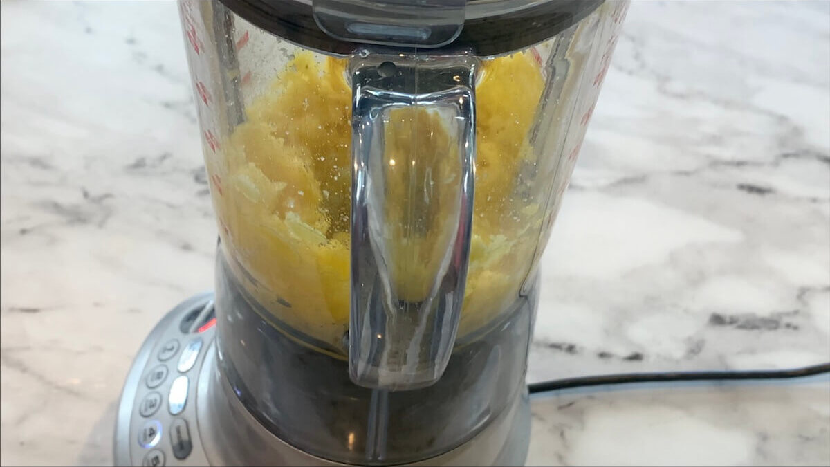 Blend the mango chunks, lemon juice, and sugar on the highest setting for 30-45 seconds to finish the sweet mango sauce.