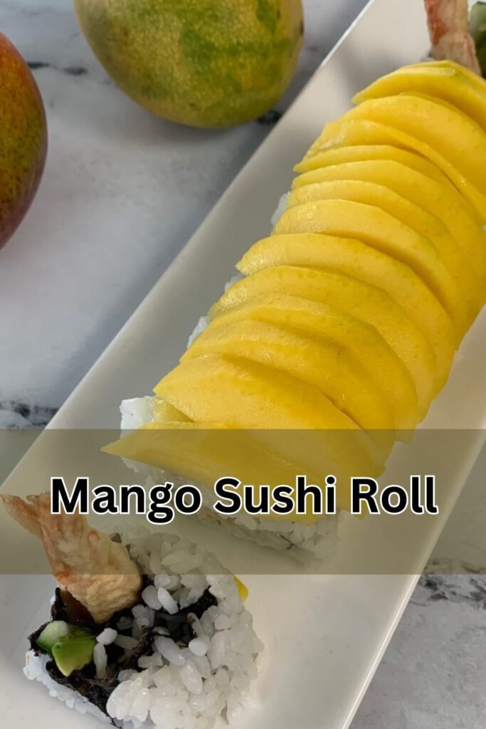 Mango sushi rolls on a sushi plate with a couple of mangos in the background