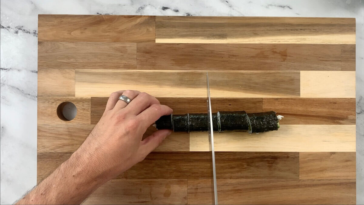 Cut the cucumber roll into eight evenly sized pieces. 