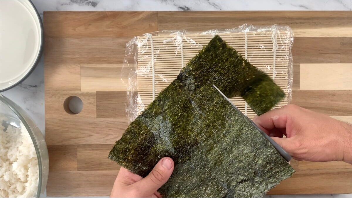 Remove the top 1/4 of the nori sheet.