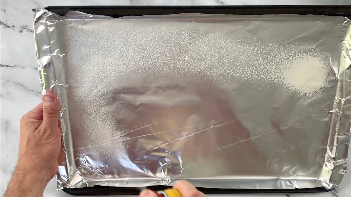 Cover and spray baking sheet