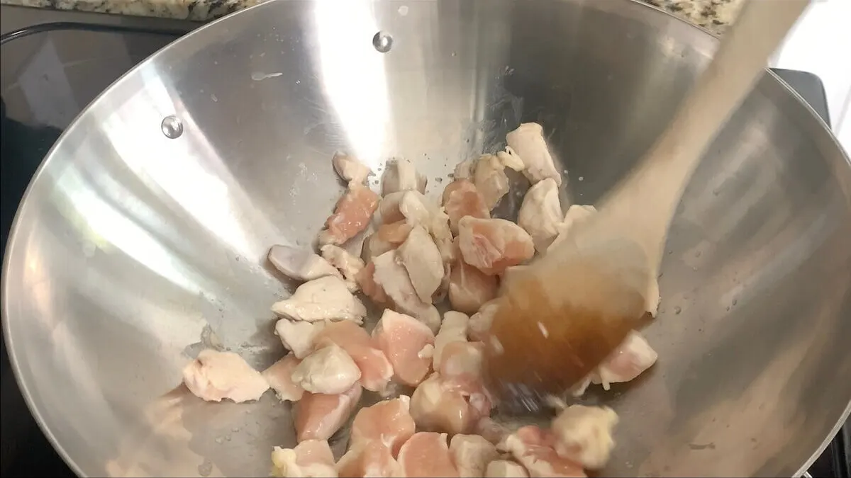 After a few minutes, stir chicken teriyaki to make sure chicken pieces are cooked on all sides.