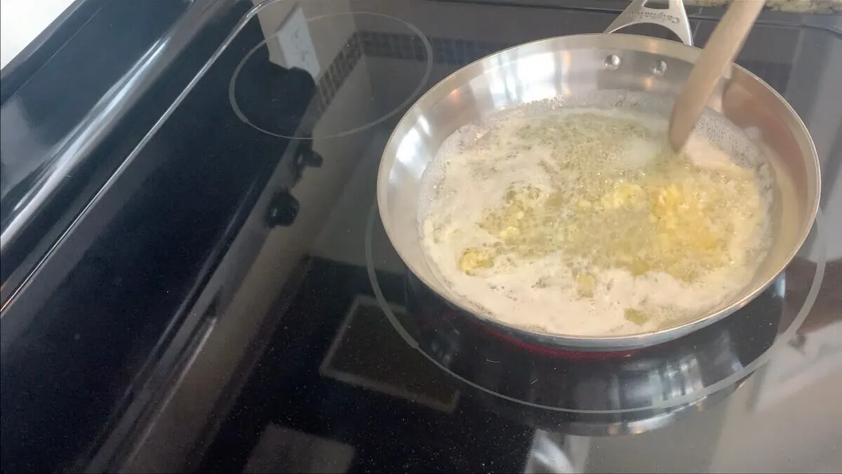 Cook the garlic in the butter.