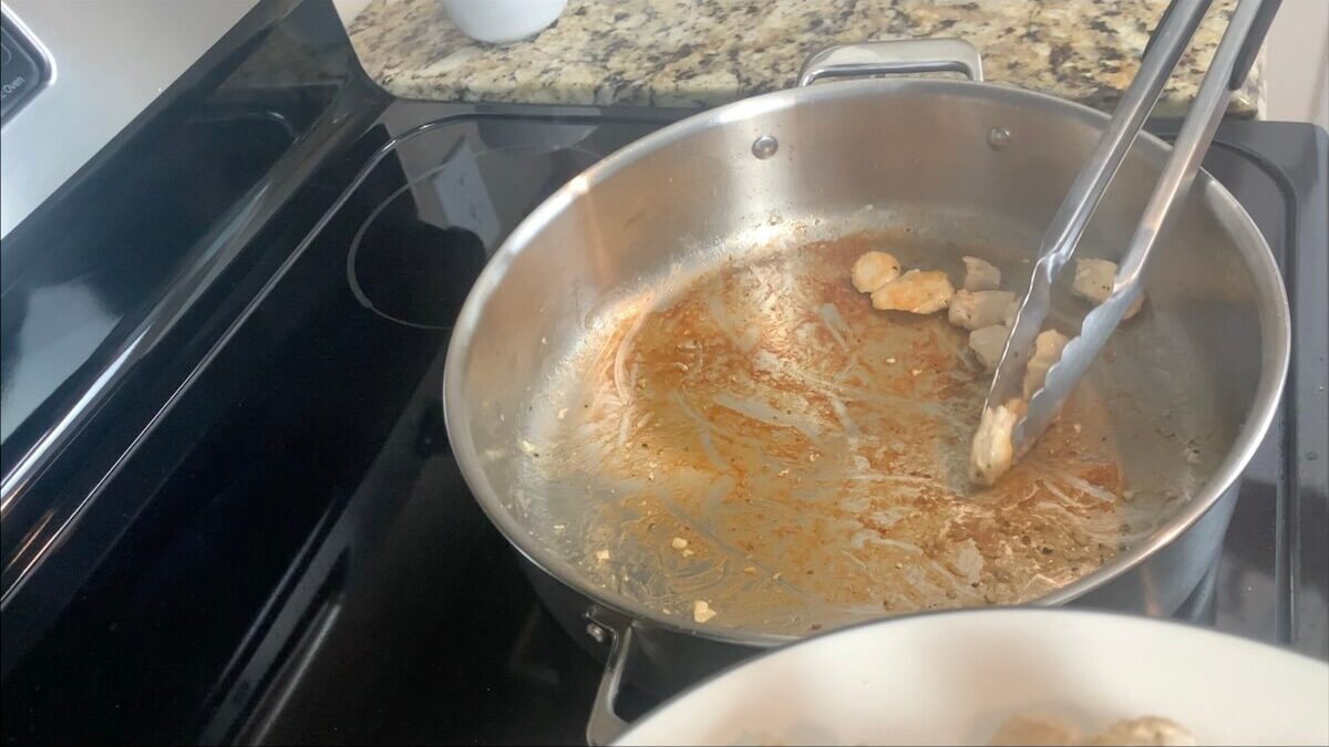 Once done cooking, remove the chicken from the pot and place aside until needed later.