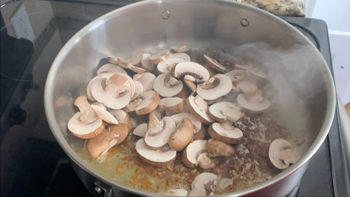 Add mushrooms in a single layer to the pan.