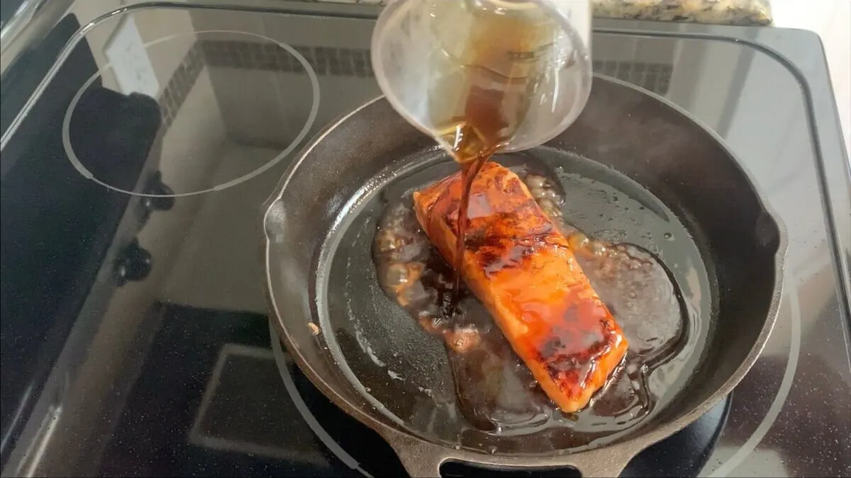 To complete your salmon teriyaki, add teriyaki sauce cook for an additional minute, basting the fish until the sauce has thickened.