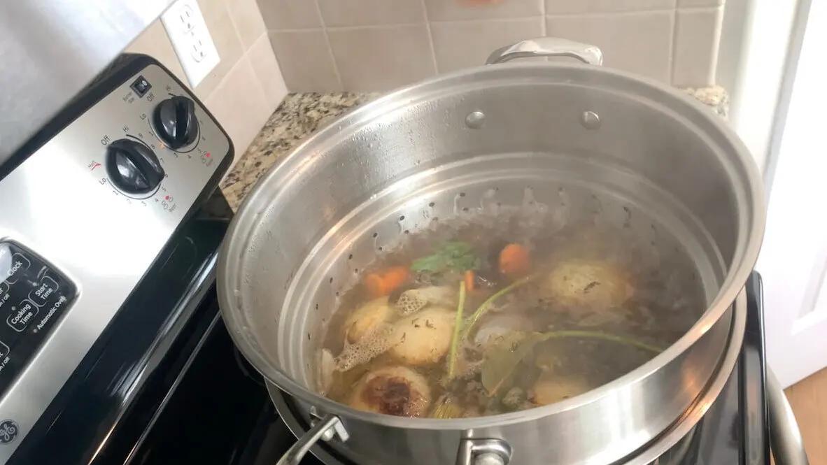 Simmer beef broth for around 4 hours.