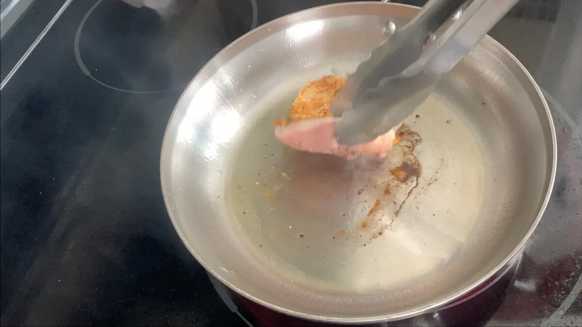 Flip the chicken after cooking on the first side for 3-4 minutes.