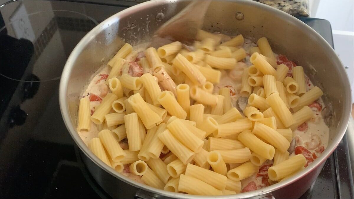 Stir roasted tomatoes, shrimp, and noodles into the Boursin cheese pasta dish.