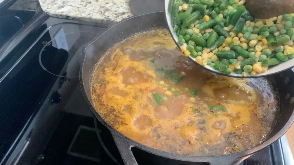Add the corn and green beans to the vegetable beef soup.