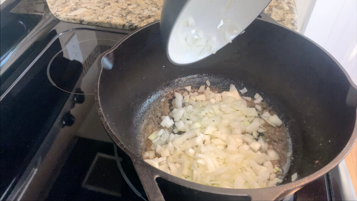 Cook onions in a large cast iron skillet.